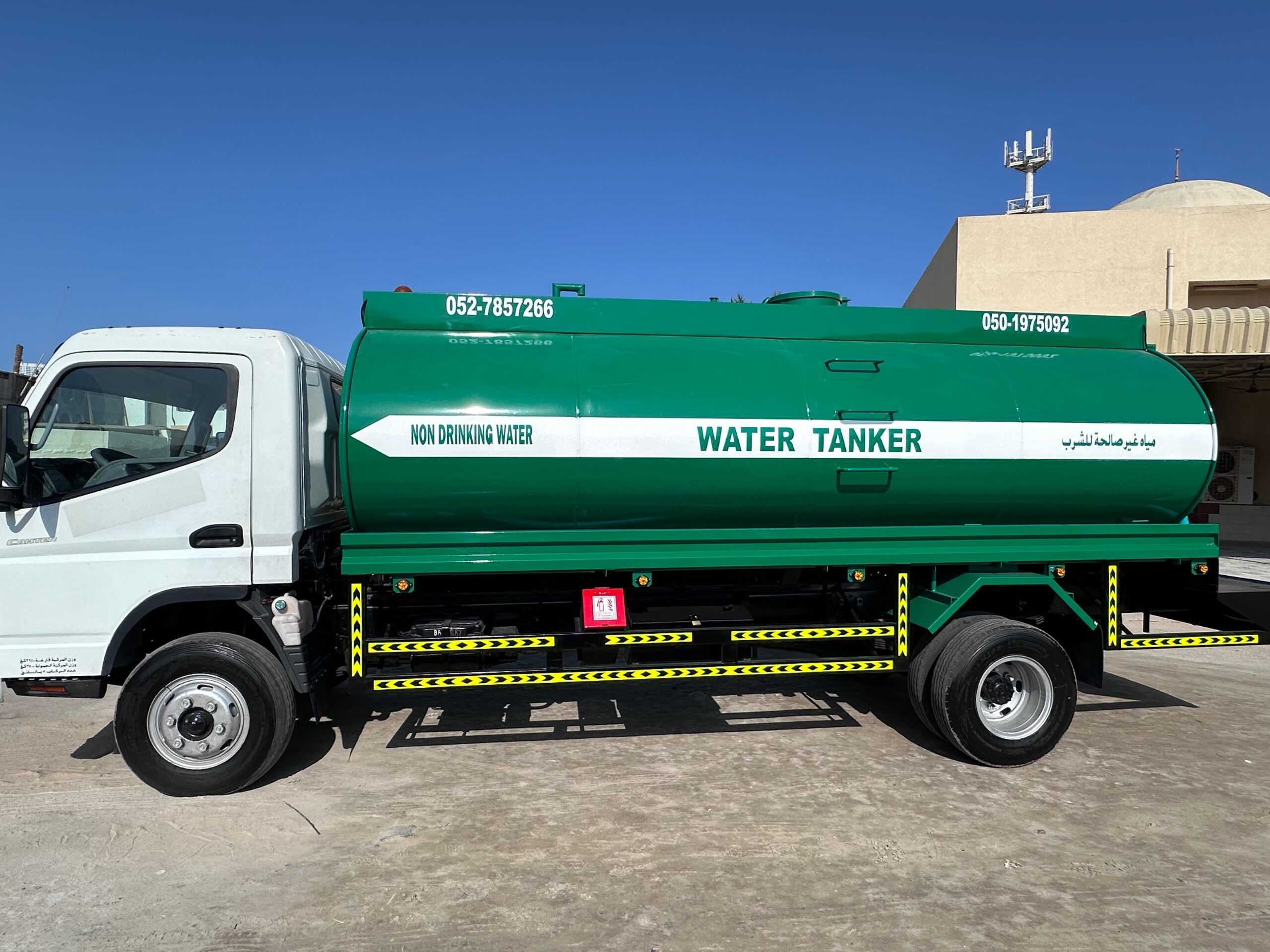 Water tanker supplying sweet water to a residential building in Ajman